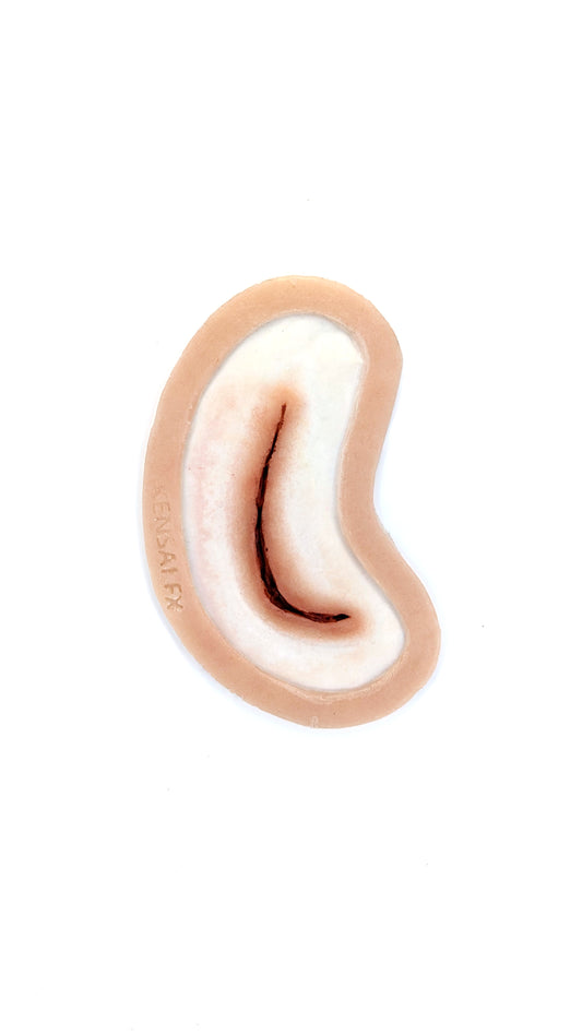 Pre-Painted Curved Laceration Encapsulated Silicone Prosthetic