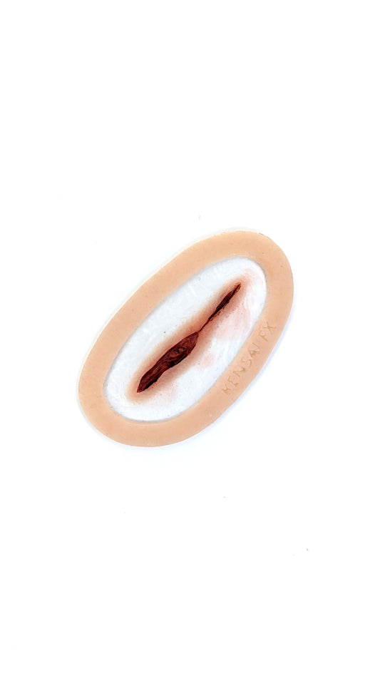 Pre-Painted Straight Laceration Encapsulated Silicone Prosthetic